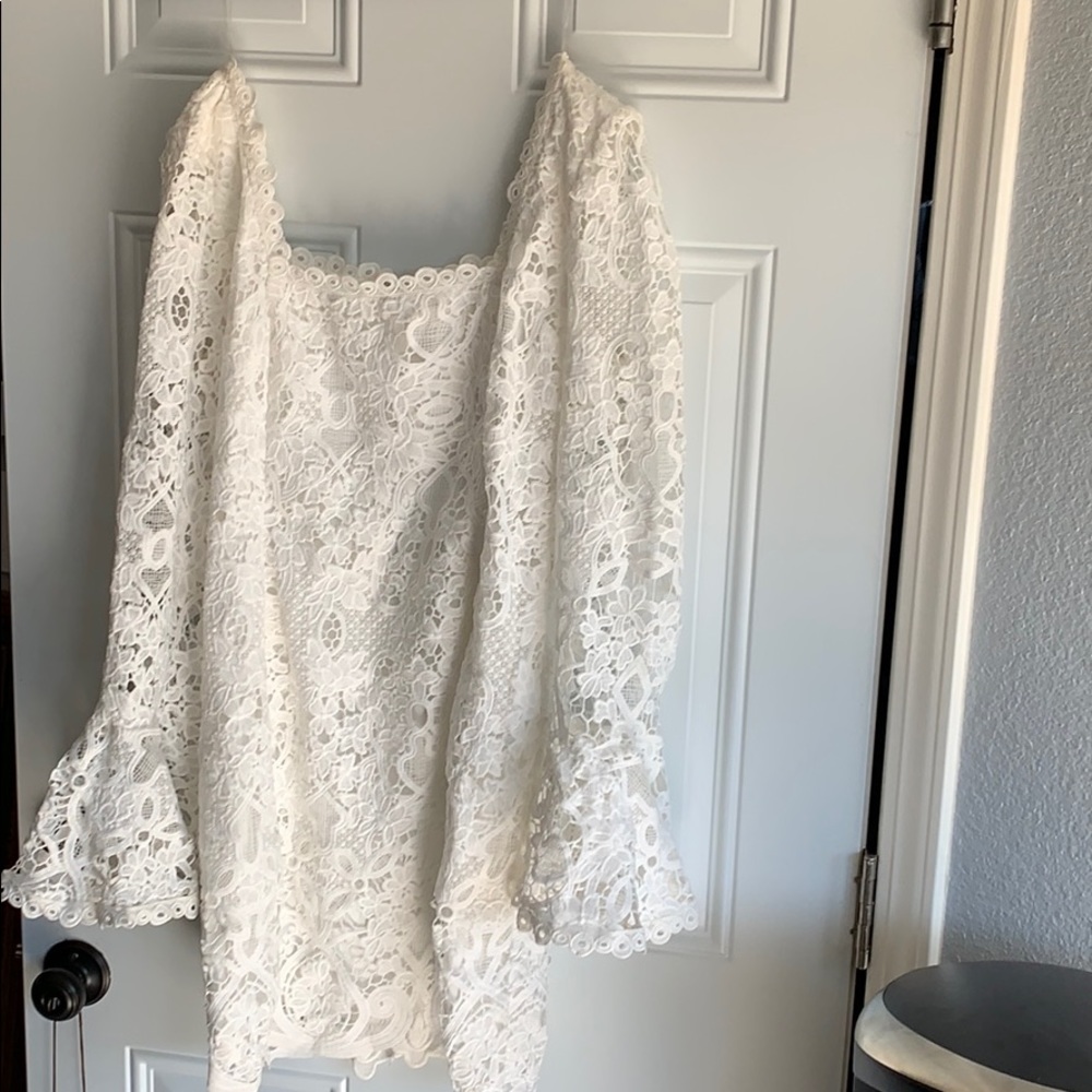 Beautiful lace knee length dress.